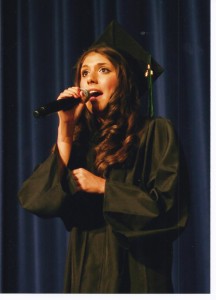 Elise performing at graduation